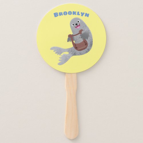 Happy cute harp seal cartoon illustration hand fan