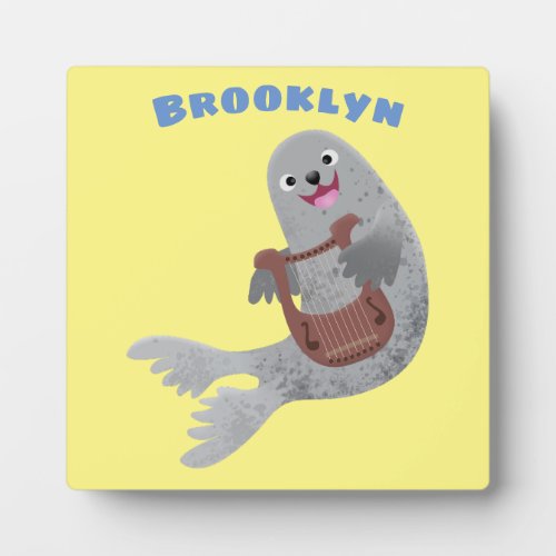 Happy cute harp seal cartoon illustration plaque