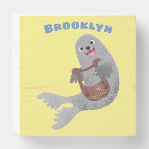 Happy cute harp seal cartoon illustration wooden box sign