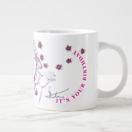 Happy cute little girl drawing giant coffee mug