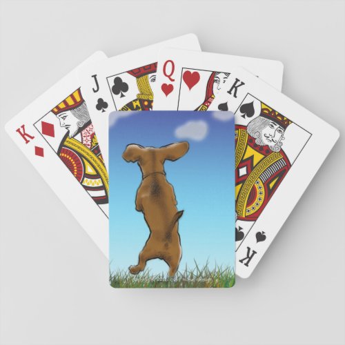 Happy Dachshund playing cards