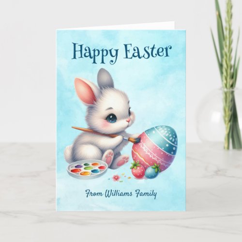 Happy Easter Bunny Water coloring an Easter egg Holiday Card