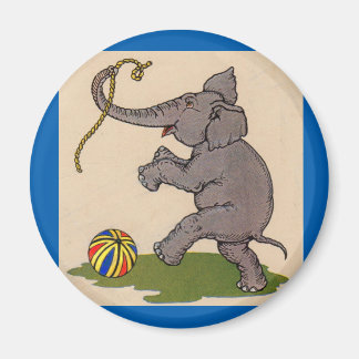 happy elephant playing with rope and ball magnet
