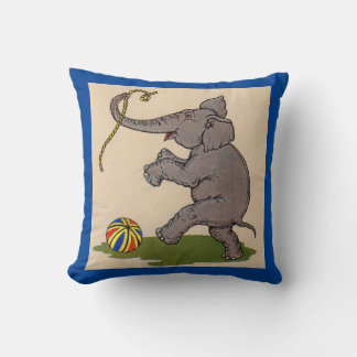 happy elephant playing with rope and ball throw pillow