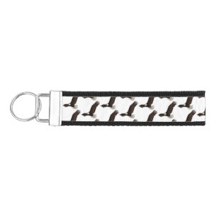 Happy flying bald eagle cartoon illustration wrist keychain