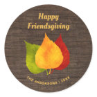 HAPPY FRIENDSGIVING AUTUMN LEAVES ON RUSTIC WOOD