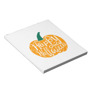 Happy Halloween lettering on carved pumpkin Notepad