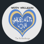 Happy Hanukkah, Baked with Love Classic Round Sticker<br><div class="desc">Personalize these Happy Hanukkah, Baked with Love stickers with your name or family name. These custom tags are perfect for your Hanukkah holiday baking, whether it be challah breads, rugelachs, or jam-filled sufganiyots. Blue, silver, and yellow heart design with stylized typography, adorned with a Star of David. If you bake...</div>