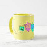 Happy Hanukkah English Hebrew Mug<br><div class="desc">There are a variety of background colors to provide either a cheery or more elegant background for the dreidel images and the Happy Hanuka greeting in both Hebrew and English. The Hebrew letters on the dreidel sides stand for: A great miracle happened here, the way the saying goes in Israel....</div>