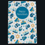 Happy Hanukkah Pattern Gift Bag<br><div class="desc">Wrap up you Hanukkah gifts in style with this Happy Hanukkah pattern gift bag. This whimsical design with dreidels, menorahs, gifts, and more is just as bright and happy as Chanukah itself and sure to bring a smile to the faces of everyone on your gift list! Part of the Hanukkah...</div>