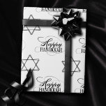 Happy Hanukkah Star of David Classic Black White Wrapping Paper<br><div class="desc">Minimal classic black Bar/Bat Mitzvah and Hanukkah modern Star of David against a solid background creates an elegant,  sophisticated design. For other coordinating colors or matching products,  visit JustFharryn @ Zazzle.com or contact the designer,  c/o Fharryn@yahoo.com  All rights reserved. #zazzlemade #christmasdecor</div>