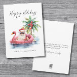 Happy Holidays Santa Claus Beach Christmas Holiday Card<br><div class="desc">Get into the holiday spirit with this unique Christmas card featuring a relaxed Santa Claus in sunglasses lounging in a pink flamingo floaty in the ocean. Perfect for sending beachy holiday wishes, this card is ideal for anyone living in tropical places like Florida, Hawaii, or the Bahamas, or for those...</div>