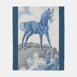 happy horse in blue fleece blanket