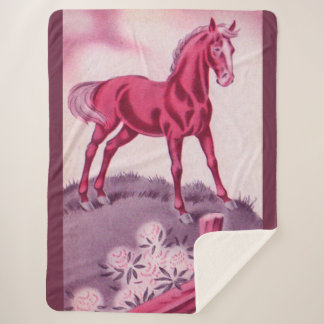 happy horse in pink sherpa blanket