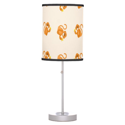 Happy monkeys eating a banana pattern table lamp