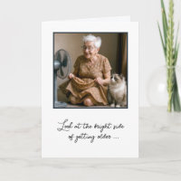 Happy Old Lady Cooling Off By a Fan