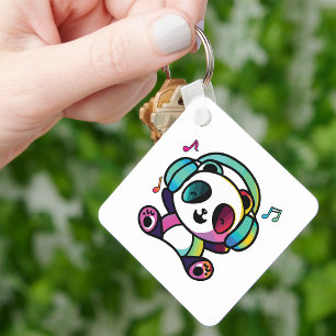 Happy Panda with headphones listening to music. Keychain