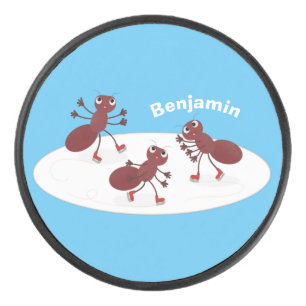 Happy red ants ice skating cartoon hockey puck