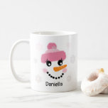 Happy Snowman (Girl) and Snowflakes - Personalized Coffee Mug<br><div class="desc">Adorable Christmas holiday coffee or hot cocoa mug features a happy little snowgirl face. She has rosy pink cheeks, an orange carrot for a nose, and her eyes and smile are made out of coal. She's wearing her fuzzy pink hat so she can be fashionable. There's silver and pink snowflakes...</div>