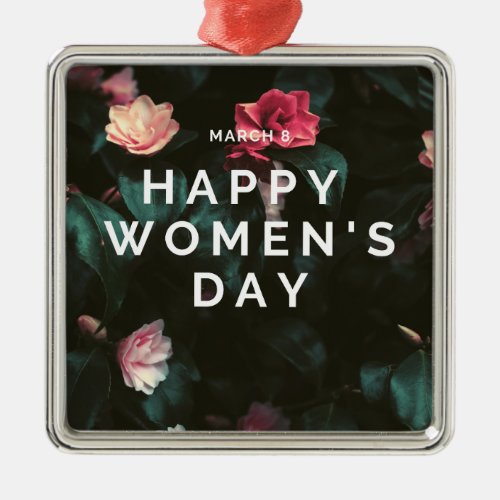 Happy women's day text on floral metal ornament