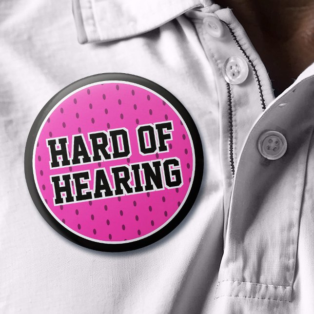 Hard of Hearing Pink Black Sporty Varsity Deafness Button (Mockup of pin on white polo shirt)