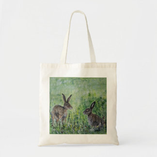 Hares in a meadow shopping bag