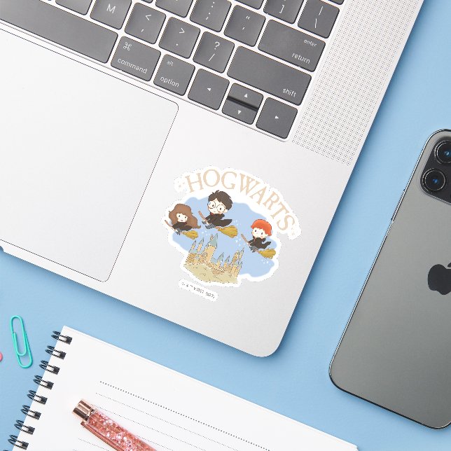HARRY POTTER™, Hermione, & Ron Fly Over HOGWARTS™ Sticker (Laptop w/ iPhone)