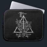 Harry Potter Spell | DEATHLY HALLOWS Graphic Laptop Sleeve<br><div class="desc">Become the Master of Death with this intricate graphic of Harry Potter's Deathly Hallows. This cool design depicts the symbol for the Elder Wand, the Resurrection Stone and the Cloak of Invisibility, all of which make up the Deathly Hallows. This illustrative design may not help you dodge death but it...</div>