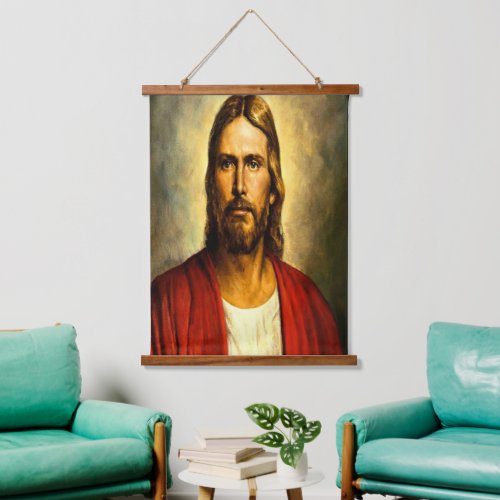 Has Jesus with his eye looking straight at you Hanging Tapestry