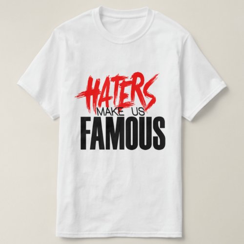 Let your confidence shine as you sport this powerful declaration across your chest. Designed for all ages and genders, our t-shirt comes in sizes suitable for everyone from girls and boys to women and men. Because in the world of hip hop, inclusivity is key, and anyone can rock this fresh look with style and attitude. Crafted from high-quality materials, our t-shirt stands shoulder to shoulder with other top brands in terms of durability and comfort. We understand that when it comes to urban fashion, you need clothing that can keep up with your dynamic lifestyle. That's why we've spared no expense in ensuring that our tees not only look good but feel good too. Whether you're hitting the streets or hitting the stage, our "Haters Make Us Famous" t-shirt is the perfect addition to your wardrobe. Let your clothing do the talking as you express your love for hip hop music and culture in a graphic tee that speaks volumes. And the best part? Despite its top-notch quality, our t-shirt remains affordable, because we believe that everyone should have access to premium urban fashion without breaking the bank. So why settle for ordinary when you can stand out in extraordinary? Elevate your streetwear game with our "Haters Make Us Famous" tee and make a statement that resonates with hip hop enthusiasts worldwide. Because in the world of fashion, it's not about fitting in—it's about standing out and owning your unique style. Don't just wear a t-shirt; wear a symbol of confidence, resilience, and passion. Wear our "Haters Make Us Famous" tee and let the world know that no matter what they say, you're here to stay, and you're destined for greatness.