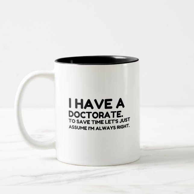 HAVE A DOCTORATE IN SAVING TIME Two-Tone COFFEE MUG (Left)