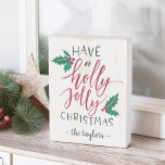 Have a Holly Jolly Christmas Personalized Holiday Wooden Box Sign<br><div class="desc">Add a rustic touch to your holiday decor with this wintry wood box sign. Typography based design features the phrase "have a holly jolly Christmas" in hand lettered type accented with red and green holly leaves and berries. Personalize with your family name or custom message beneath.</div>