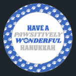 Have a Pawsitively Wonderful Hanukkah Classic Round Sticker<br><div class="desc">Introducing our delightful Hanukkah design featuring a charming border of white paw prints on a blue background. Embrace the festive spirit of Hanukkah with this design, which encloses a clean white background showcasing the heartfelt text "Have a pawsitively wonderful Hanukkah." The text is presented in blue and silver colors, with...</div>