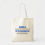 Have a Pawsitively Wonderful Hanukkah Tote Bag<br><div class="desc">This delightful design showcases the heartfelt text "Have a pawsitively wonderful Hanukkah." The text is presented in blue and silver colors, with the letter "o" in "wonderful" playfully substituted with a paw print. This design captures the joy and celebration of Hanukkah with a pet-friendly twist. The combination of blue and...</div>