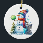 Have the Merriest Christmas by Par | Disc Golf Ceramic Ornament<br><div class="desc">Have the merriest Christmas by par. Disc golf themed art. Cute watercolor cartoon snowman in Santa hat next to a disc golf basket in the snow next to a Christmas tree.</div>