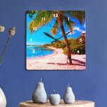 Hawaii Palm Tree Tropical Beach Vintage Look Photo Square Wall Clock<br><div class="desc">Rewind back to memories of lazy, tropical beach days whenever you gaze at this Hawaii vacation retro, vintage look, distressed wall clock of a lone palm tree on a sandy, crescent beach, with clear turquoise blue skies and water. Your choice of a round or square clock face. Makes a great...</div>