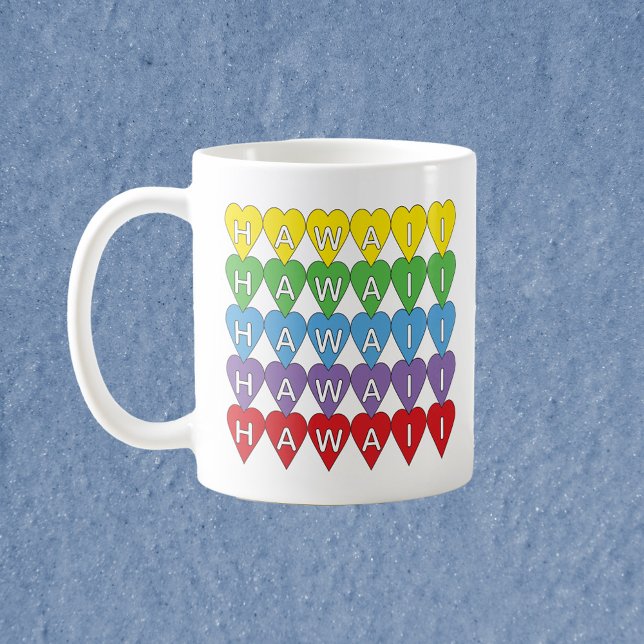 Hawaii Rainbow Hearts Coffee Mug (A mug with a rainbow heart pattern that spells Hawaii.)