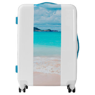 Hawaii tropical sandy beach turquoise ocean photo luggage