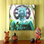 Hawaii Turquoise Blue Buddha Statue Photo Peace Canvas Print<br><div class="desc">“Peace.” I happily discovered this Asian Buddha statue in a lush Hawaiian garden setting, exuding peace and solitude. Whenever I gaze at this serene image, it makes me contemplate and imagine what I can accomplish. Makes a great gift for someone special! You can easily personalize this wall art plus I...</div>