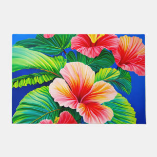 Hawaiian hibiscus tropical red flowers and green doormat