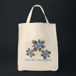 Hawaiian Holly Hanukkah Blue Floral Tote Bag<br><div class="desc">Hau’oli Hanukaha is Hawai'ian for Happy Hanukkah! This illustration showcases a tropical interpretation of holly in Hanukkah colors and subtle gradients. The lettering is dusted with snow for an added surprise. For that special chef in your life,  this original illustration is shown here on the cotton grocery tote.</div>