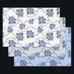 Hawaiian Holly Hanukkah Blue Floral Trio Wrapping Paper Sheets<br><div class="desc">Hau’oli Hanukaha is Hawai'ian for Happy Hanukkah! This illustration showcases a tropical interpretation of holly in Hanukkah colors and subtle gradients. The lettering is dusted with snow for an added surprise. This design is available on a variety of products for the home and apparel for the entire family. This trio...</div>