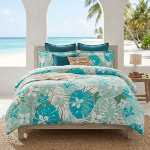 Hawaiian print monstera and palms on blue duvet cover