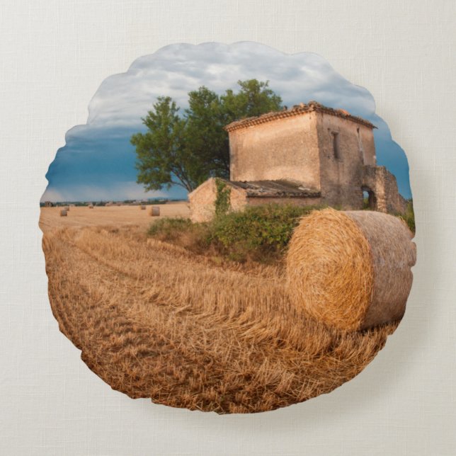 Hay bale in Provence field Round Pillow (Front)