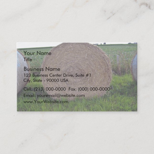 Hay bale rolls in a green field business card (Front)
