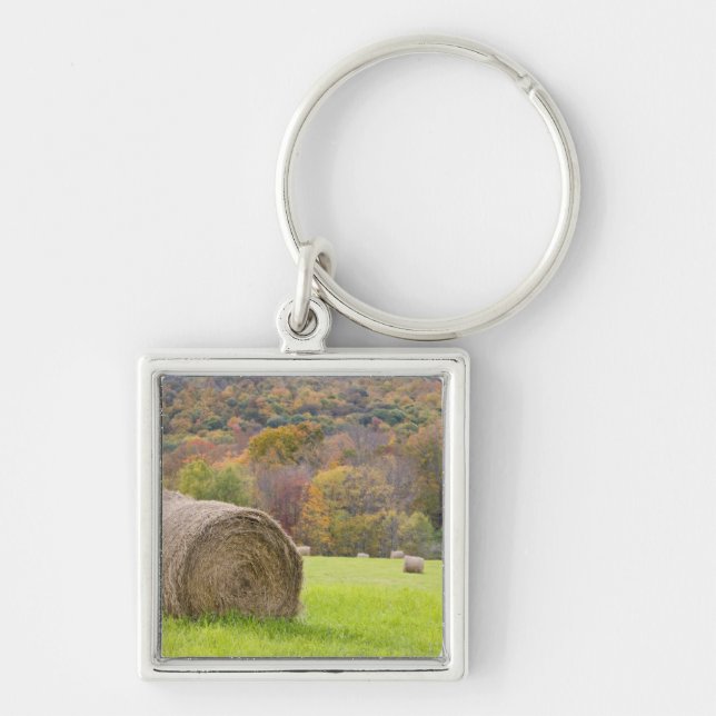 Hay bales and fall foliage on farm, keychain (Front)