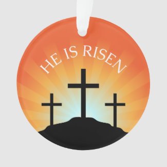 He is risen cross against sunrise Easter