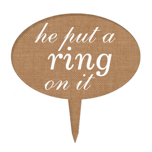 "he put a ring on it"  Cake Pick on burlap (Front)