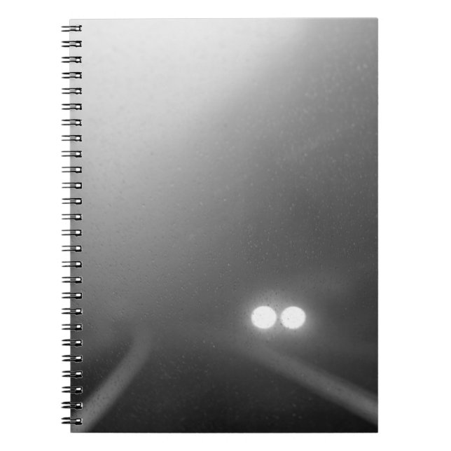 Headlights from a windscreen on a rainy night notebook (Front)