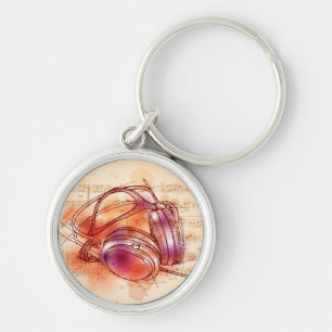 Headphones on a watercolor background & notes keychain